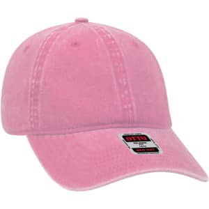 A pink 6 panel low profile dad cap with a curved brim and a logo on the front.