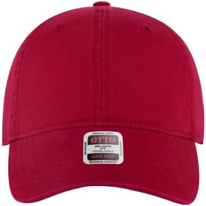 A red six-panel low profile dad cap with a branded tag.