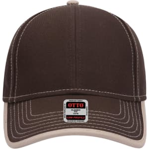 A brown low profile baseball cap with a light-coloured brim and a logo stitched on the front.