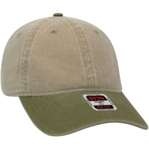 A low-profile six-panel dad cap in light brown with an olive green brim, featuring a logo label.