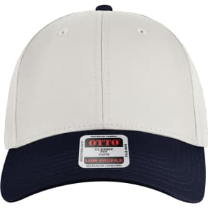 A low profile baseball cap featuring a cream upper and a navy peak, with a logo on the front.