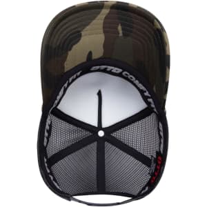 A high crown mesh back trucker hat in camouflage with a black interior and a logo on the band.