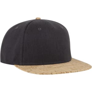 A black snapback cap with a cork brim and a logo on the front. It features a pro style design.