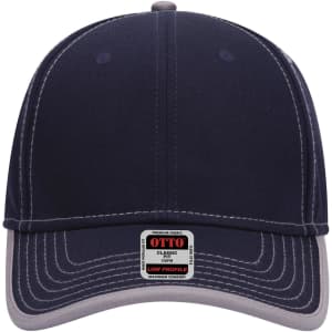 A low-profile baseball cap in navy blue with a light grey brim and an attached brand tag.