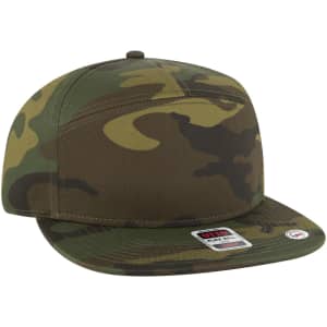 A camo-patterned snapback cap with a flat brim and a branding label on the front.