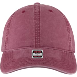 A dusty rose 6 panel low profile dad cap with a logo on the front and stitching details.