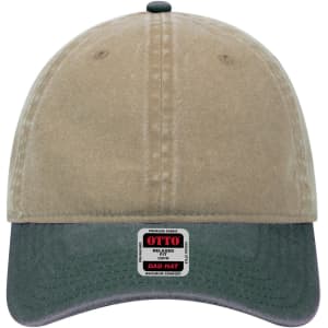 A low profile dad cap featuring a beige crown and a dark green visor, with a logo on the front.