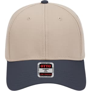 A beige and navy 6-panel low profile baseball cap with a branded label on the front.