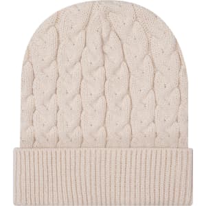 A cream cable knit beanie with a rib knit cuff, featuring a logo on the cuff.