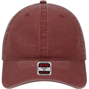 A maroon six-panel low profile dad cap with a curved brim and a logo on the front label.