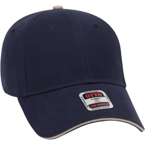 A navy blue 6 panel low profile baseball cap featuring a branded label on the front.