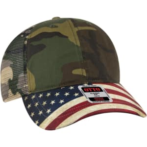 A camouflage and mesh trucker cap with a structured design and an American flag bill. Features a logo on the front.