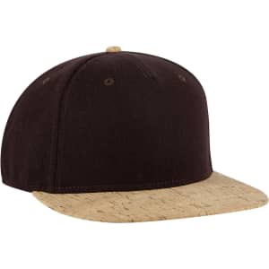 A black and cork 5 panel snapback cap featuring a flat brim and a logo on the front.