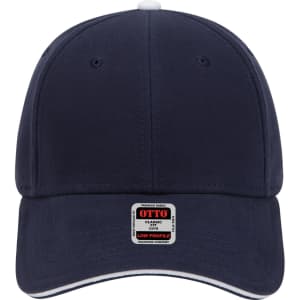 A navy blue 6 panel low profile baseball cap featuring a logo and contrasting trim.