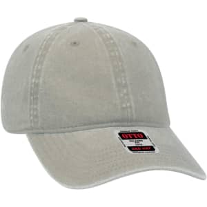 A light grey six-panel low profile dad cap with a branded tag.