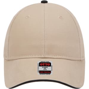 A beige 6-panel low profile baseball cap with a branded tag at the front and a contrasting dark peak.