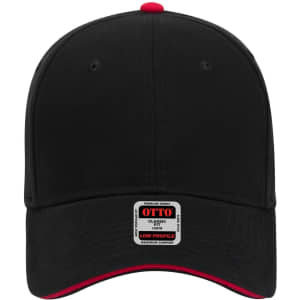 A black low-profile baseball cap with a red underside, featuring a branded tag on the front.