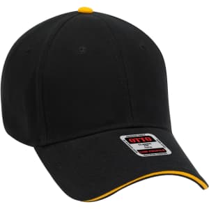 A black low profile baseball cap with a yellow accent and a logo on the front.