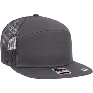 A grey 7 Panel Trucker Cap featuring a solid front and mesh backing, with a logo on the side.