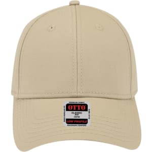 A beige 6 panel low profile baseball cap with a front panel and a logo tag on the brim.