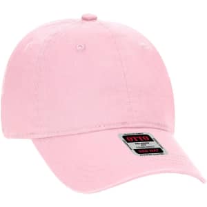A pastel pink six-panel low profile dad cap with a branded tag. Ideal for youth headwear.