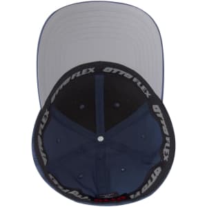 A navy blue six-panel low profile baseball cap featuring a grey underbrim and an inner band with a logo.