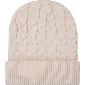 A cream cable knit beanie with a rib knit cuff, featuring a logo.