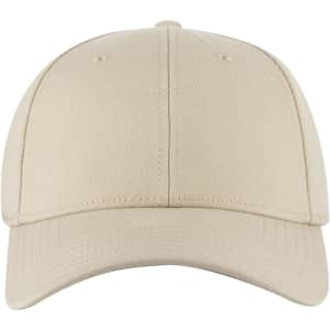 A beige six-panel low profile baseball cap with a logo on the front.