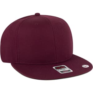 A burgundy snapback cap with a flat brim and a branded tag on the side.