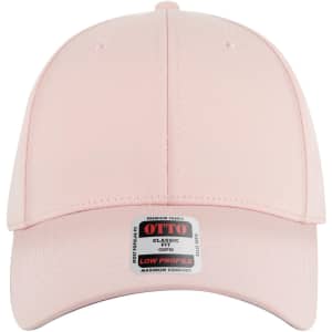 A pink 6 panel low profile baseball cap with a branded tag at the front.