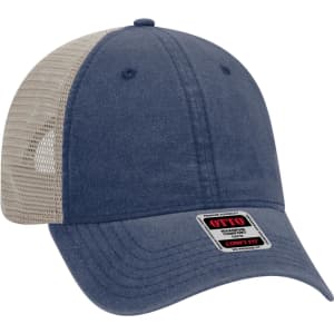 A navy blue trucker cap with a low profile and a beige mesh back, featuring a logo on the front.