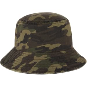 A camouflage bucket hat with a wide brim and a simple design. It features a logo on the side.