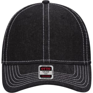 A black denim six-panel low profile trucker cap with contrasting white stitching and a logo tag on the brim.