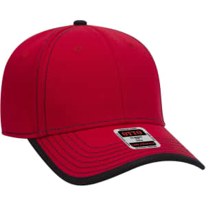 A red 6 panel low profile baseball cap with black accents and a logo on the side.