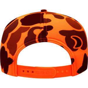 A high crown foam cap in orange with a brown camouflage pattern and an adjustable strap at the back.