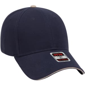 A navy 6 panel low profile baseball cap with a light-coloured peak and a logo on the front.