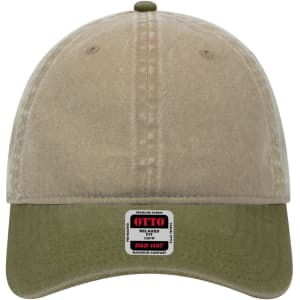 A 6 panel low profile dad cap featuring a beige top and an olive green brim, with a logo on the front.