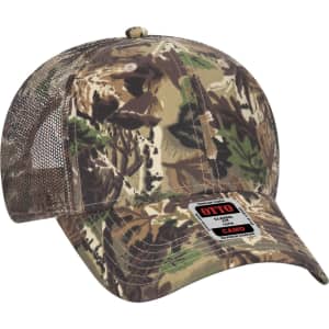 A camo-patterned low profile trucker cap featuring a mesh back and a branded label.