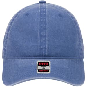 A blue 6 panel low profile dad cap featuring a front logo. The fabric has a soft, faded appearance.
