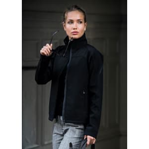 A black soft shell jacket featuring a high collar and stylish design, worn by a model holding sunglasses.