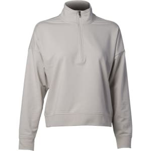 A women's quarter zip pullover in light grey, featuring long sleeves and a mock neck design. It has a branding logo.