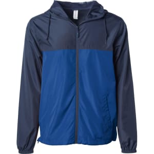 A men's lightweight windbreaker zip jacket featuring a blue and navy colour design and a hood. It has a logo on it.