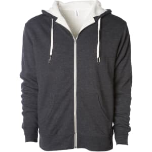 A unisex zip hoodie in dark grey with a white Sherpa lining and drawstring hood. It features front pockets and a logo.