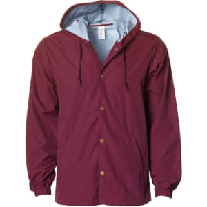 A maroon hooded windbreaker with a light blue lining and a button-up front. It features a logo on the chest.