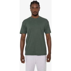 A short sleeve crew tee in a dark green colour, paired with light grey bottoms. The shirt features a logo.