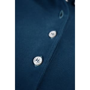 A navy blue polo shirt featuring buttons and a collar, with a logo.