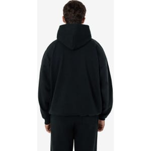 A heavy fleece hood pullover in black, featuring a relaxed fit and a hood at the back. The model is seen from behind.