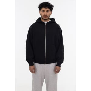A black heavy fleece zip-up hoodie with a hood, worn by a person standing against a neutral background.