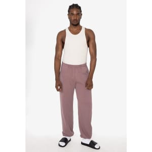 Heavy fleece sweatpants in mauve, styled with a white tank top and black sandals, featuring an elastic waistband.