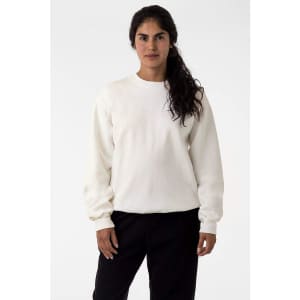 A white heavy fleece pullover jumper with a round neck and long sleeves on a model. It features a logo.